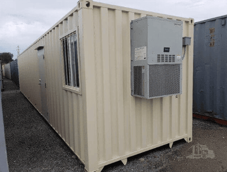 Office container exterior with air conditioner, window and office door installed